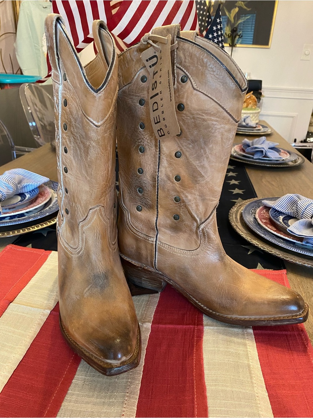 Women’s distressed tan leather boots